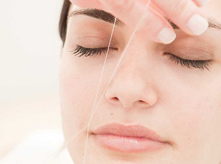 Triệt ria mép bằng sợi chỉ