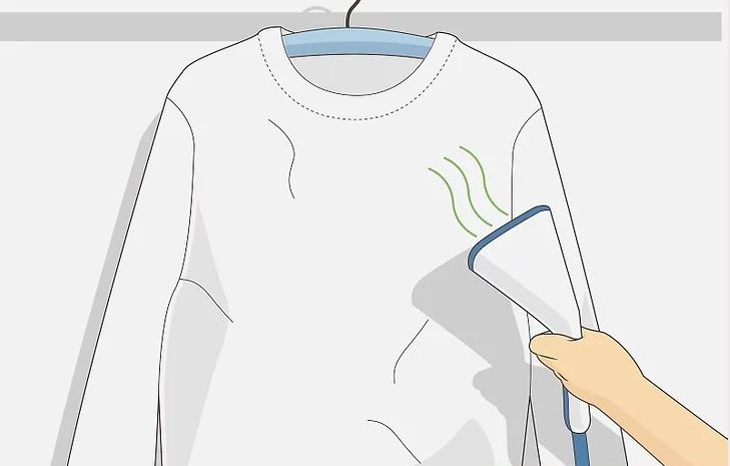 Dùng bàn là hơi nước để loại bỏ vết nhăn