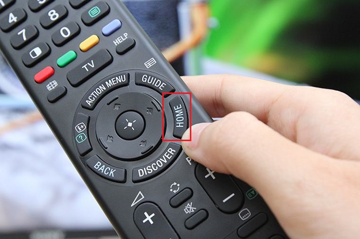 Nhấn nút Home trên remote tivi