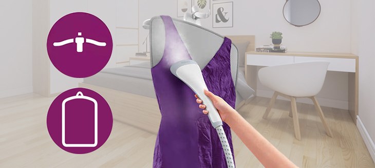 Bạn nên giữ một tay cầm đầu ủi hơi nước và điều chỉnh di chuyển trên vải, tay kia nắm chặt bộ phận của quần áo đang ủi