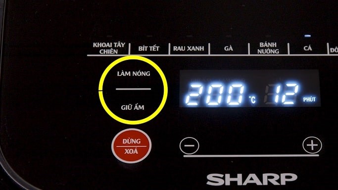 Các biểu tượng chức năng nấu tự động bao gồm Làm nóng và Giữ ấm