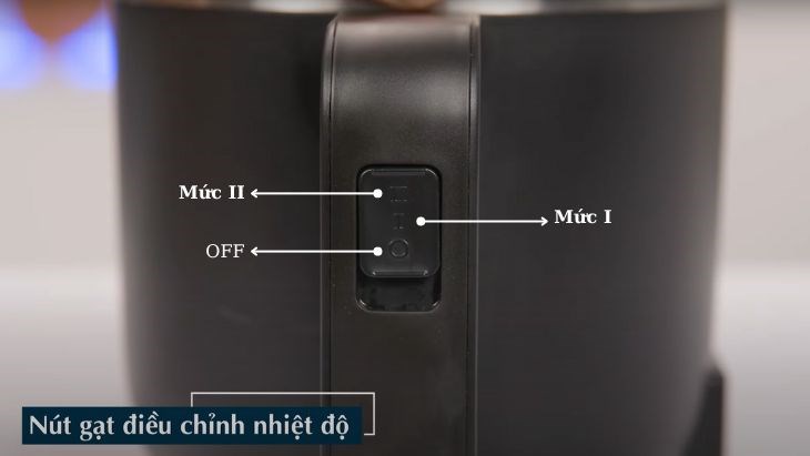 Chi tiết nút gạt điều chỉnh nhiệt độ nằm trên tay cầm tiện lợi
