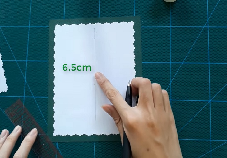 Kẻ một đường thẳng dài 6.5 cm