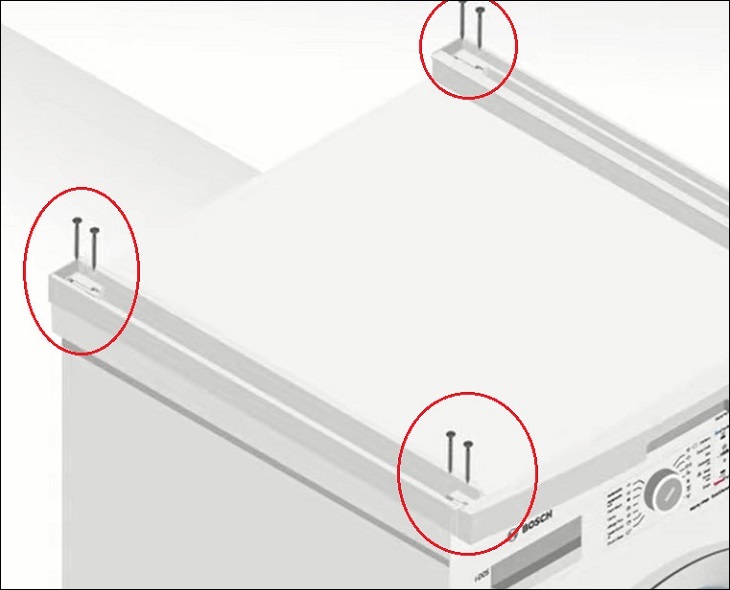 Thực hiện khoan các lỗ đã xác định ở mặt trên máy giặt.