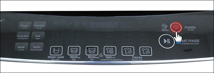 Nhấn nút Power trên máy giặt