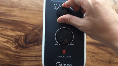 Chỉnh nguồn điện  - Quạt sưởi nhiệt Midea MH-P15-C