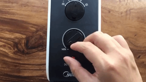 Chỉnh nhiệt độ - Quạt sưởi nhiệt Midea MH-P15-C