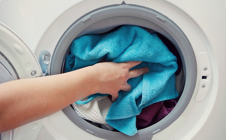 giặt quá tải hoặc thiếu tải
