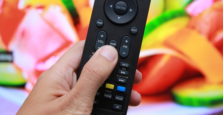 Nhấn nút HOME trên remote