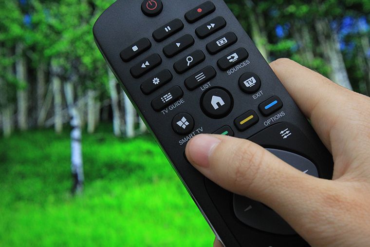 Nhấn nút SMART TIVI